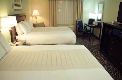 Devils Lake Hotel | 2 Welcoming Rooms Near Historic Fort Totten | Pet Friendly, Free Parking, Pool