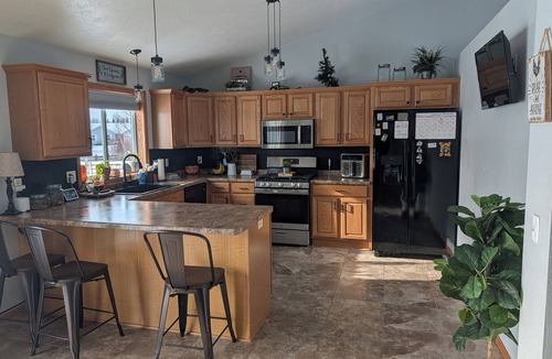 Omro House | 3-bedroom house with Fishing Pond! Only 11 miles from EAA grounds!