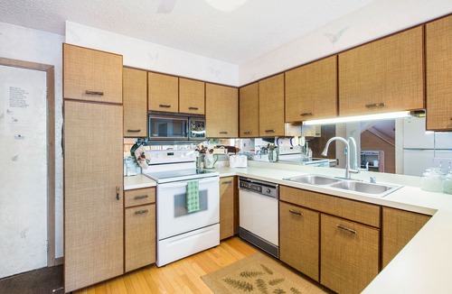 Harbor Springs Condo | 3-story dog-friendly condo w/free WiFi, balcony, shared heated pool, fireplace