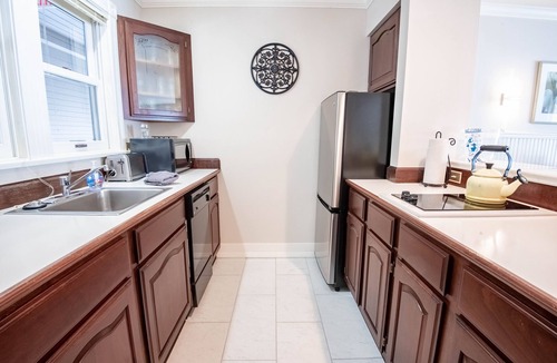 Boyne City Condo | 309 Water Street | Lake Charlevoix Condo | Fireplace | Private Beach Access
