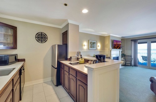 Boyne City Condo | 309 Water Street | Lake Charlevoix Condo | Fireplace | Private Beach Access