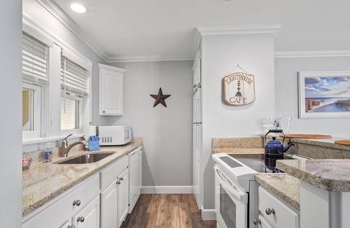 Boyne City Condo | 315 Water Street | Lake Charlevoix Condo | Private Beach Access | Fireplace