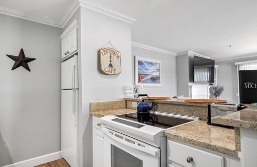 Boyne City Condo | 315 Water Street | Lake Charlevoix Condo | Private Beach Access | Fireplace