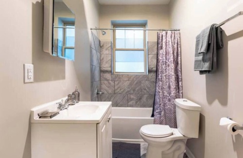 Detroit Apartment | 3BD with Sunroom, WiFi and Gated Parking