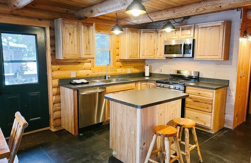 Cook Cabin | 4 bedroom 3 bath Log Cabin with Sand Beach, water toys, sauna, yoga, game room