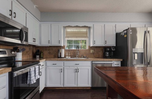 Lenexa House | 4BR Home on Private Acreage | Game Room