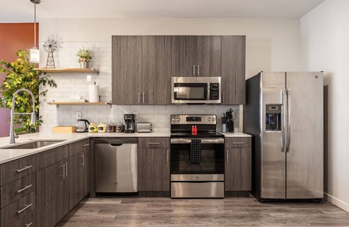 Downtown Louisville Apartment | 4th Street Suites - Serene King Bed Suite