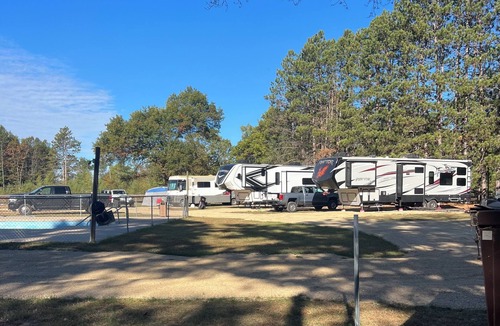 Wisconsin Dells RV Rental | 50/30 Amp RV site with full hookup’s . Semi-private & Secluded