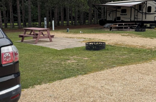 Wisconsin Dells RV Rental | 50/30 Amp RV site with full hookup’s . Semi-private & Secluded