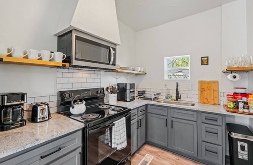 Central Oklahoma City House | 5BR home 12 mins from State Fair Park. Full kitchen, free parking. Sleeps 14. #40