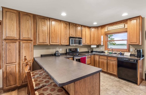 Wautoma House | 5BR Retreat: Waterfront, Kayaks, BBQ & More