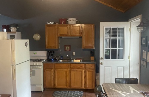 Ludington Cottage | #8 cottage comes with boat docks and shares over 600’ of frontage on Hamlin lake
