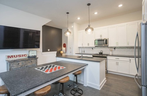 Nashville Condo | 857 ~ 4 Private Suites ~ 4 Miles to Downtown ~ Walk to Hot Spots ~ Garage Parking ~ Super Clean