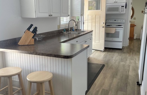 Rapid City Cottage | ACROSS FROM TORCH LAKE'S FAMOUS SANDBAR