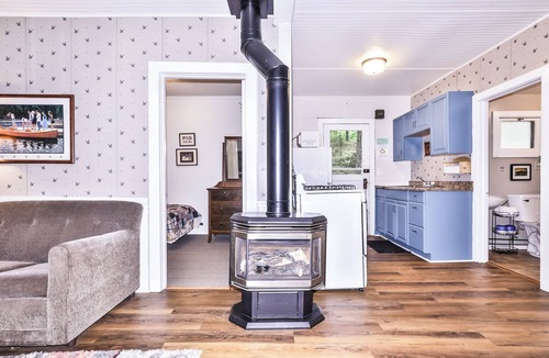 Lake Tomahawk Cabin | Adorable private home on the Minocqua Chain! Private dock and fireplace