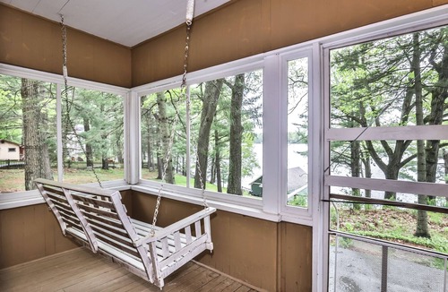 Lake Tomahawk Cabin | Adorable private home on the Minocqua Chain! Private dock and fireplace