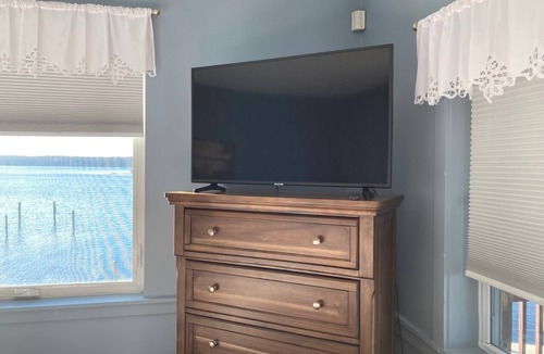 Naples Apartment | Apartment Overlooking Brandy Pond w/Boat Slip