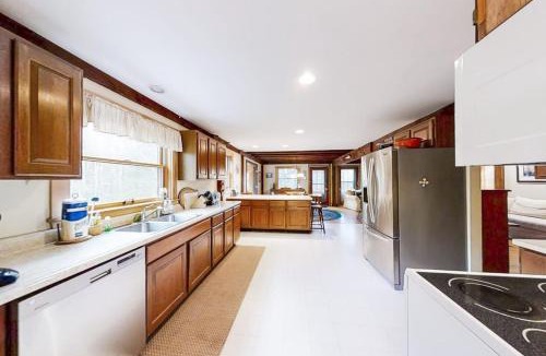 Bayville House | Appalachee Pond Waterfront Cottage | Decks, Sunroom, Dock with Kayaks & Canoe