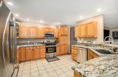 Interlochen House | Bass Lake Lodge · Private Beach · Sleeps 14