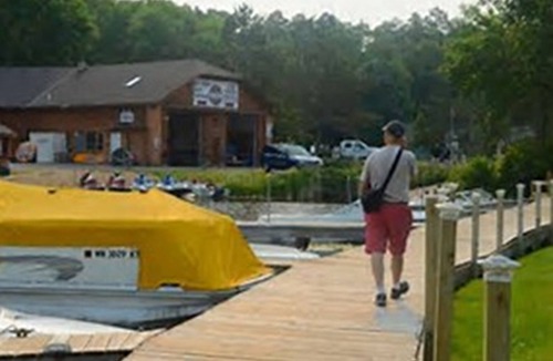Lake Shore Resort | Beautiful cabin on Gull Lake with access to resort's indoor pool and hot tub