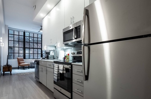 Central Business District Condo | Beautiful Condo- Heart of Business District 403