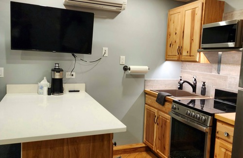 Mancelona Condo | Beautiful sleeps 4 Schuss Village Golf Course, pool, boat parking, Nearby Lakes