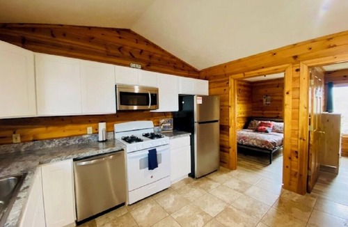 Mayfield Cabin | Beautiful Waterfront, Traverse City AC, dog ok, pontoon rentals, outdoor hot tub