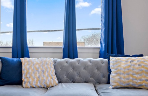 Northeast Minneapolis Arts District Apartment | Blue Horizon Hideout 2 Bedroom Home W/ Balcony