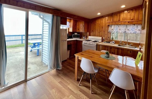Oscoda Cabin | Blue Moon Resort CABIN 6 LAKEFRONT WITH SUNROOM