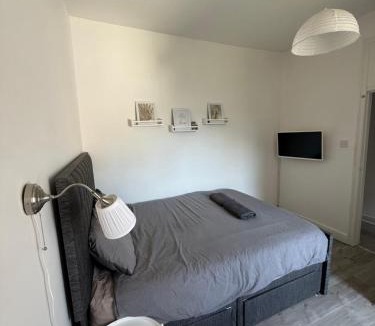 Gorgie Apartment | Bright bedroom with king side bed and share bathroom