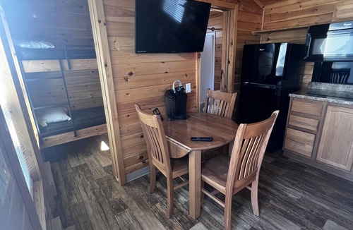 Dickerson Run Cabin | Cabin 4 - Stay like royalty. Sit on your concrete patio overlooking the beautiful Youghiogheny River.