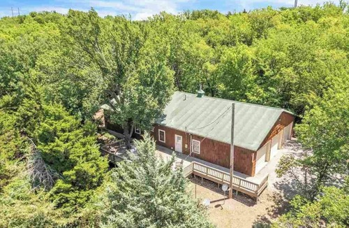 Ponca City Cabin | Cabin on 50 acres, Only 5 Minutes to Ponca City! Hike, Hunt, or Just Relax