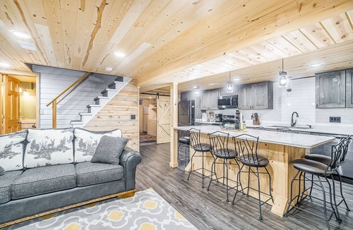 Thompsonville House | Cabin-style home, close to Crystal Mountain, right along the river