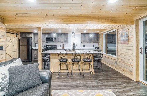 Thompsonville House | Cabin-style home, close to Crystal Mountain, right along the river