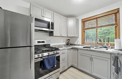Grayling Resort | Camp Cedar Resort: Three home resort*Sleeps 11*On Manistee River
