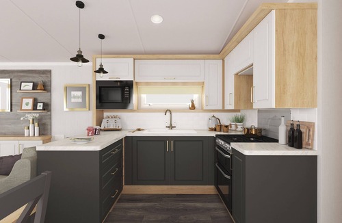 Waren Mill House | Caravan with one double and one twin.