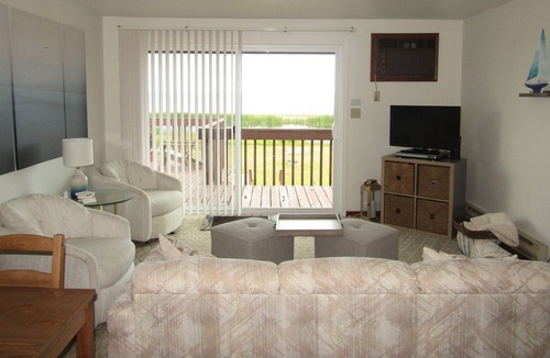 Au Sable Condo | Carpe Diem 365 located on Lake Huron sandy beach!