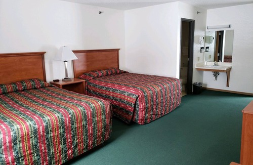 Carrington Hotel | Carrington Inn & Suites