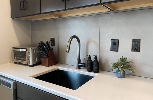 Traverse City Condo | Central Contemporary Condo with Parking!