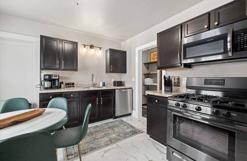 Rapid City Apartment | Centrally Located-Fire Pit- Hot Tub-Fenced Yard