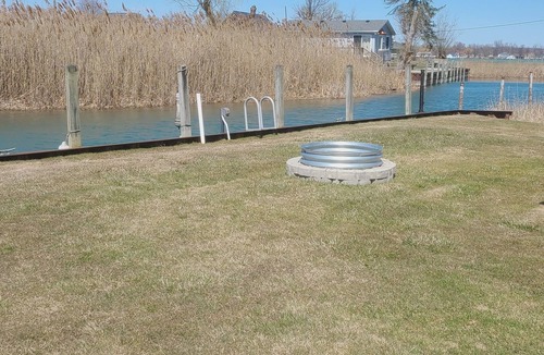 Harsens Island Cottage | Charming 2-bedroom cottage with WiFi, AC on a peaceful Harsens Island canal.