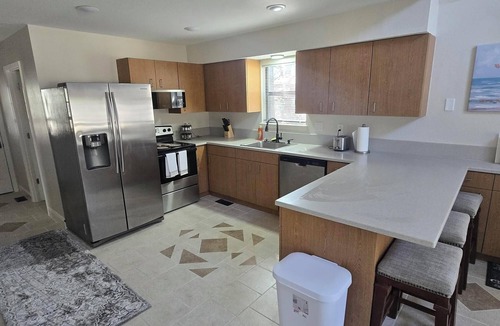 Warsaw House | Charming 3-bedroom plus extra beds in the basement living room in lovely Warsaw