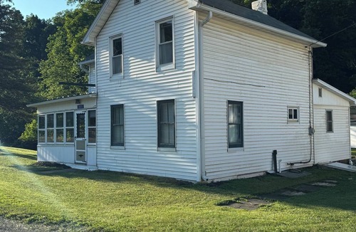 Wellsboro Cabin | Charming 4-bedroom cabin in Morris perfect for relaxing getaways by the creek