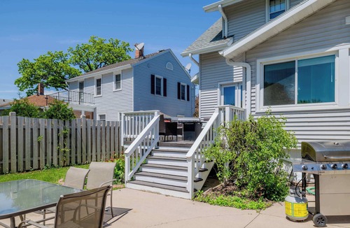 Oshkosh House | Charming Downtown Family Home with 3 Season Porch
