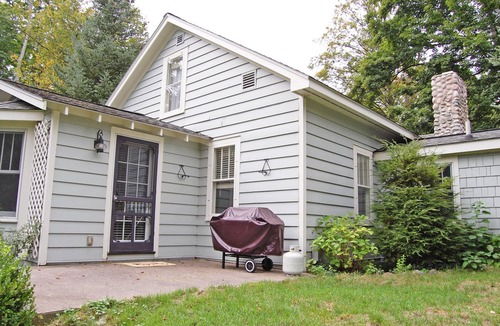Maple City Cottage | Charming home near Glen Arbor with a porch, gas grill, lake views, & AC