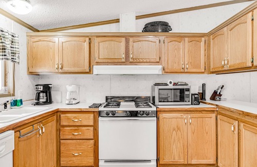 Boulder Junction House | Charming home with gas grill, full kitchen, deck, patio, TV, and washer/dryer