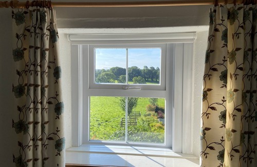 Penrith House | Charming Lake District cottage with beautiful views, parking & EV charger.