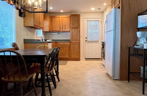 Mercer Cabin | Charming Lakefront Cabin. 100 ft private beach with dock on Lake of the Falls.