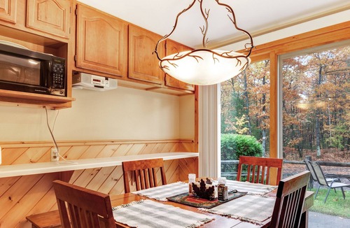 Eagle River Condo | Charming lakefront condo w/ gas fireplace, private deck close on chain of lakes!