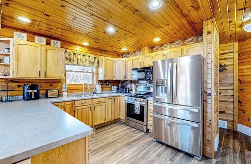 Friendship House | Charming & peaceful cabin with fire pit, deck, & great nature views - near golf